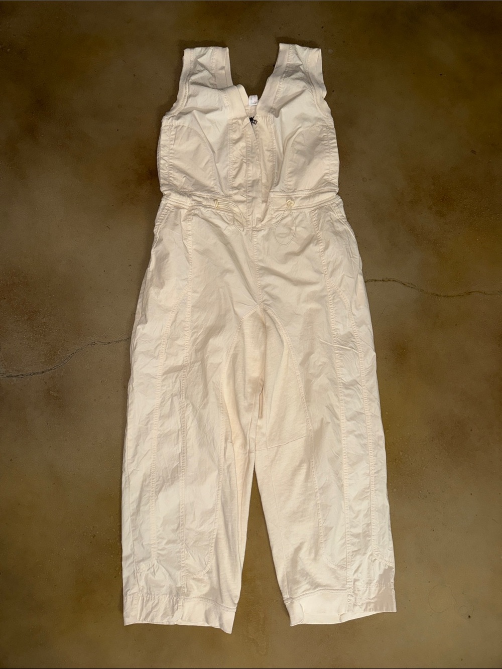 Cream sleeveless Drawstring soller jumpsuit  Anthropologie s zip daily practice